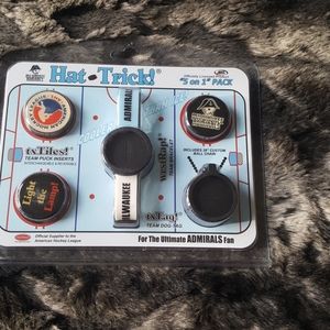 Hat trick. Hockey puck inserts. Milwaukee set.
